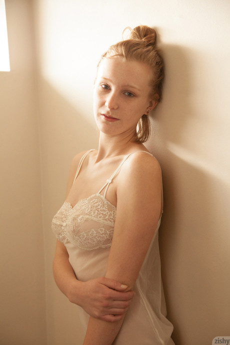 Thin red hair Terri Belk poses in nightgown before taking a nice shower