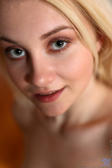 Charming yellow-haired with small melons Marilyn Sugar unveils her hot body in a solo