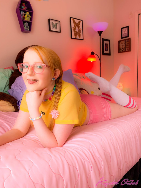 Skinny teen in glasses Krystal Orchid spreading her puffy virgin vagina