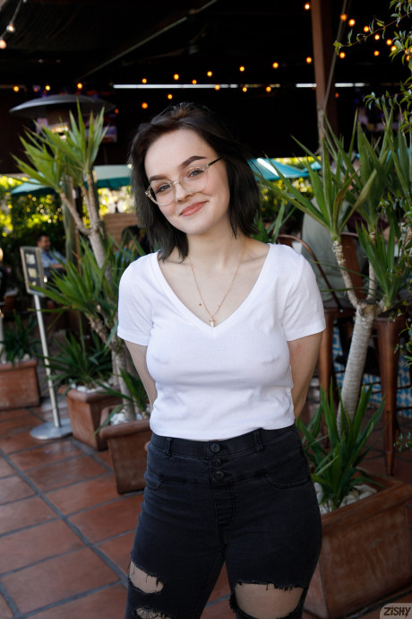 Brunette teenie Vonnie Bean teases with her monstrous juggs in a full tub