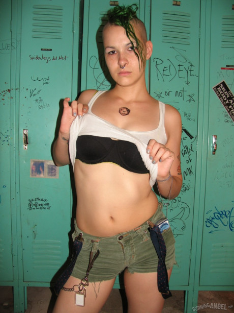 Smoking green haired fetish freak Chapel poses nude in the locker room
