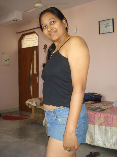 Indian plumper exposes upskirt underwear after freeing her boobs from a bra