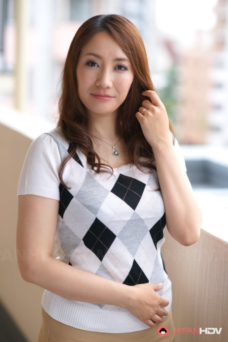 Japanese ginger head Akari Niiyama showcases her shaved cunt in sheer nylons