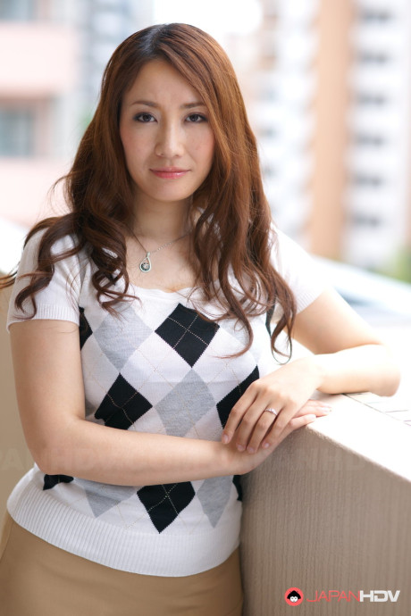 Japanese ginger head Akari Niiyama showcases her shaved cunt in sheer nylons