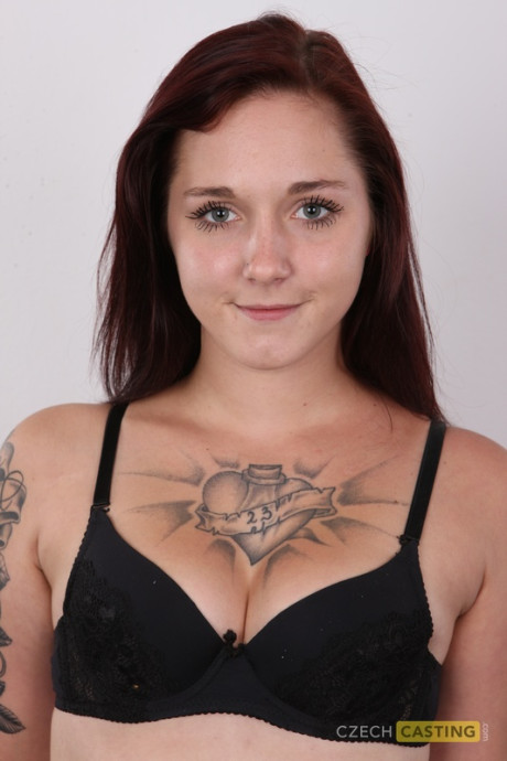 Tattooed amateur Denisa models with her clothes on and then booty nude