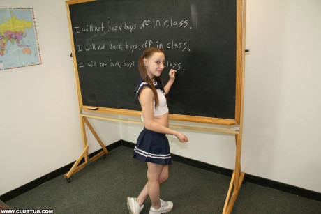 Little young giving her tall blondy teacher a great handjob in the classroom