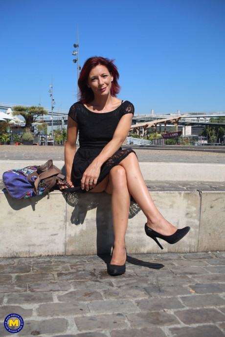 Fine French ginger cougar Morgane Dell flashes her vagina in public