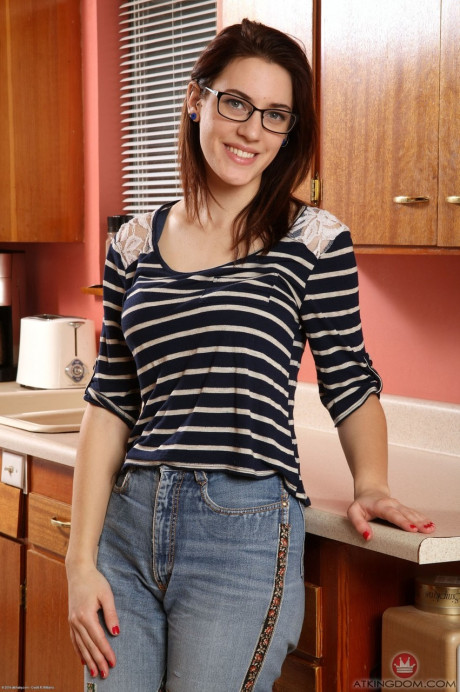 Nerdy housewife Alice Hodges bares her monstrous naturals and bush in the kitchen