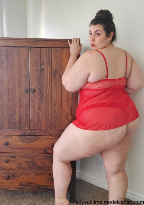 Fatty in a red negligee whore woman Sublime flaunts her large juggs while sucking a toy