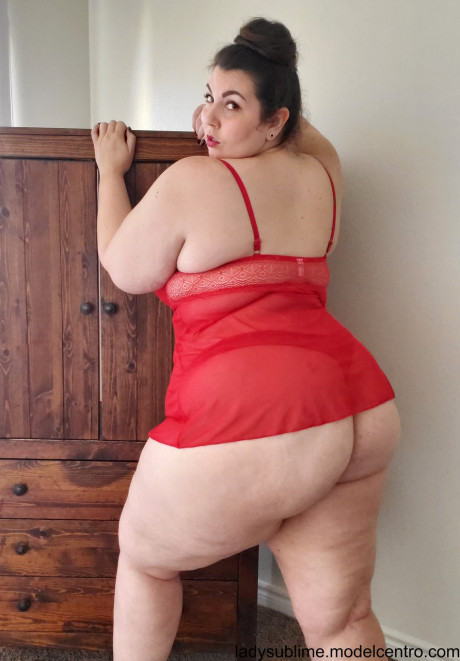 Fatty in a red negligee whore woman Sublime flaunts her large juggs while sucking a toy