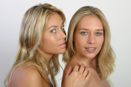 Blondie teens Lucy and Lucie tease together with their small boobies and asses