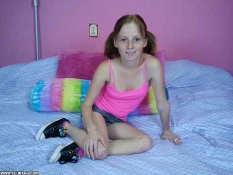 Pretty teenie Alyssa Hart takes a massive cock in her little hands and tugs it well