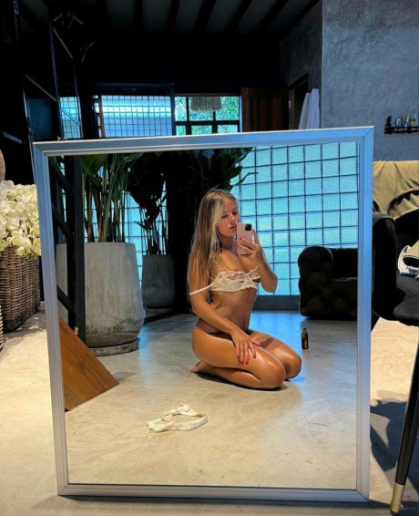 Very pretty amateur babe Baby Yona flaunts her behind and small boobies