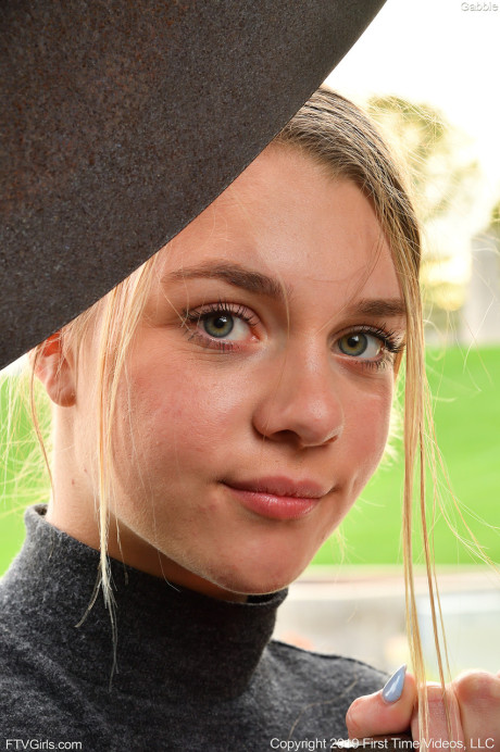 Amateur stunner Gabbie Carter revealing her monstrous natural tits poolside