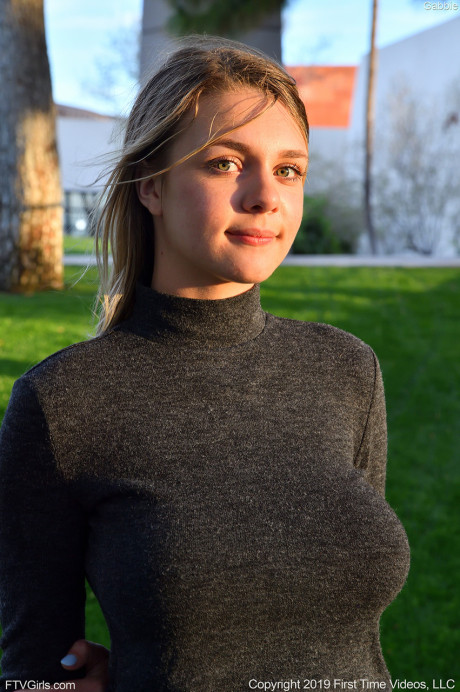 Amateur stunner Gabbie Carter revealing her monstrous natural tits poolside