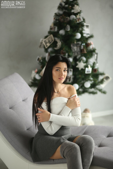 Fresh young sweety Vlada slowly undresses to get undressed at Christmas