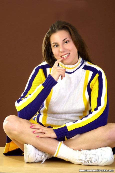 Pretty cheerleader Sally Lesters toys her wet trimmed pussy up close