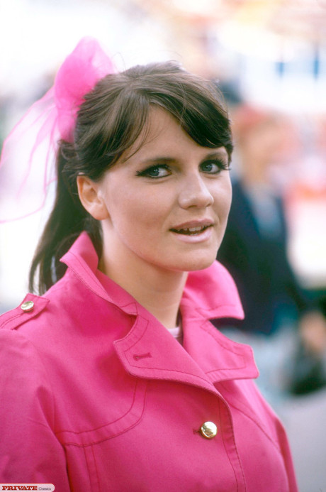 Fully clothed teenie from the 70s takes in London's sites before stripping naked