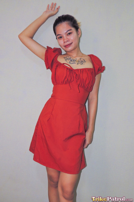 Amateur asian young Krisha Alejos shows her tattoos and body in a solo