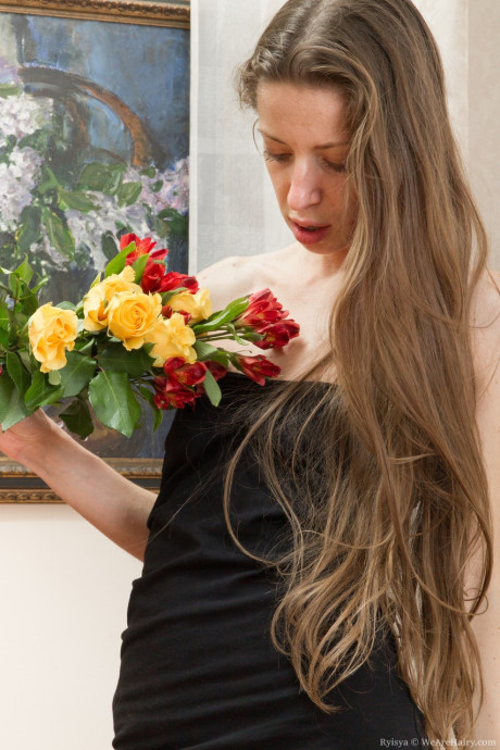 Thin Ryisya strips her outfit and panties off and teases with her furry snatch