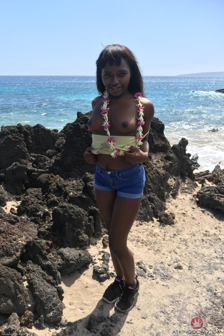 Little Afro-American teen Noemie Bilas shows her tits & choco holes in a solo