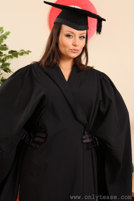 Hot babe Carla strips her graduations outfit & poses bare-breasted in hot lingerie