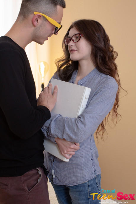 Brunette babe in glasses Ariana Shaine licks a knob before getting sexed