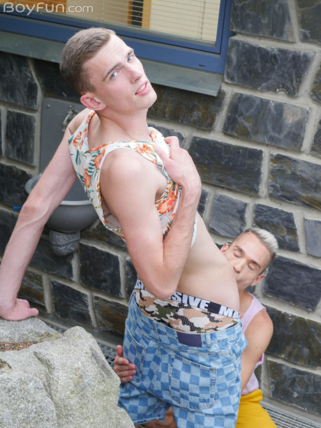 Pretty boys have anal sex on a sofa before swallowing each other's huge penii