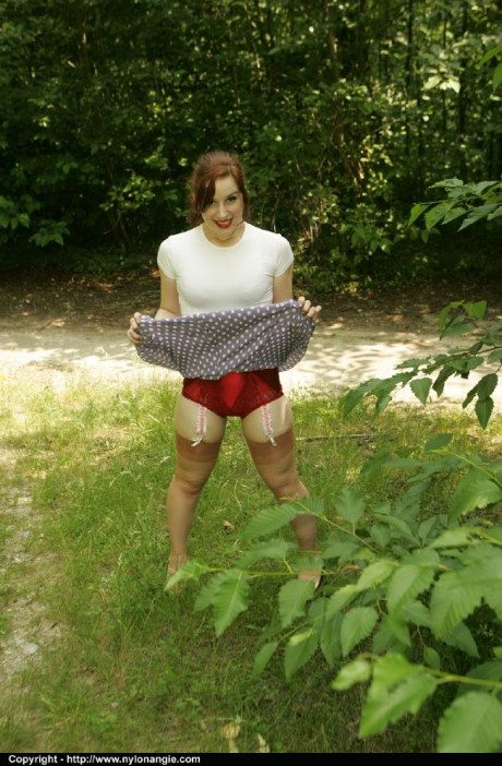 Stupendous fetish MILF in pantyhose slipping off her clothes outdoor