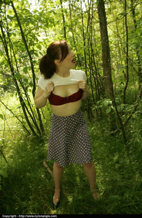 Stupendous fetish MILF in pantyhose slipping off her clothes outdoor