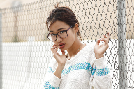 Adorable chinese babe Saki Kishima showcasing her amazing curves outdoors