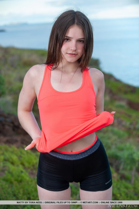 Attractive brunette Matty keeps fit with a morning run, then does her stretches and