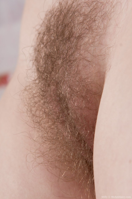 Furry housewife Milly strips naked & spreads her twat up close in the cuisine