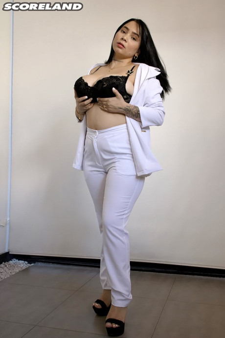 Chunky hispanic teenie Kim Velez unleashes her enormous breasts in thong undies