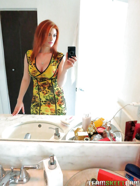 Amateur red hair skank girl chick Rainia Belle makes fine amusing self shots