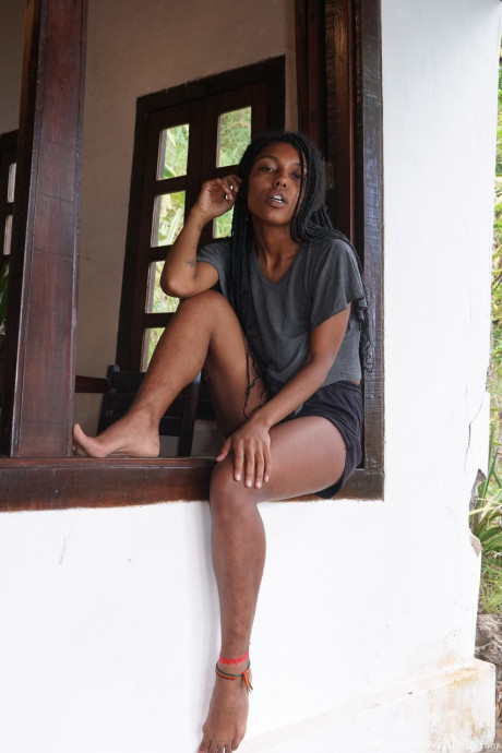 African model Sofia Cuty teases with her large natural tits & silky beaver