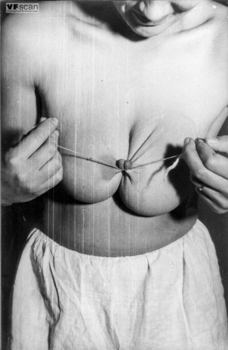 Busty model has her huge breasts bound and milked in vintage BDSM session