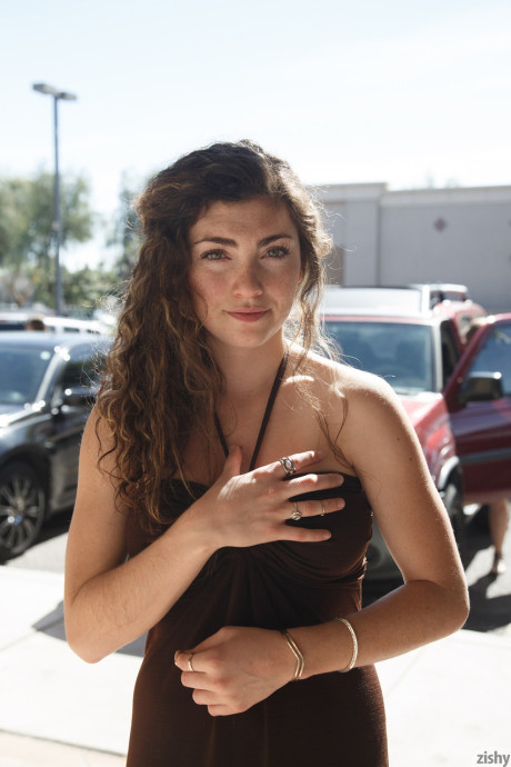 Hot teenie Gillian Barnes flashes her ravishing thighs & natural tits in public