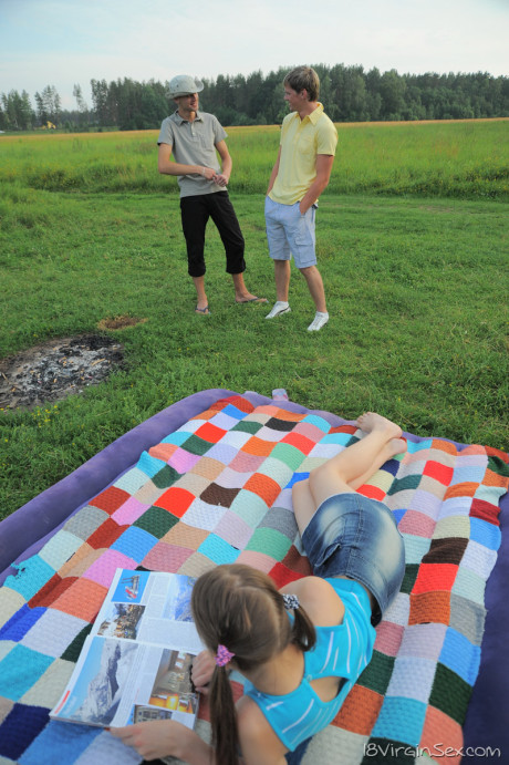 Alluring teenie Oksana enjoying hardcore sex in an outdoor 3some with two males