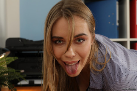 Playful secretary Ryana pisses at the office and masturbates with a toy