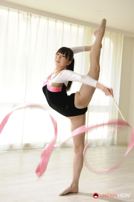 Flexible chinese sweetie Haruna puts on a gymnastic routine while getting naked