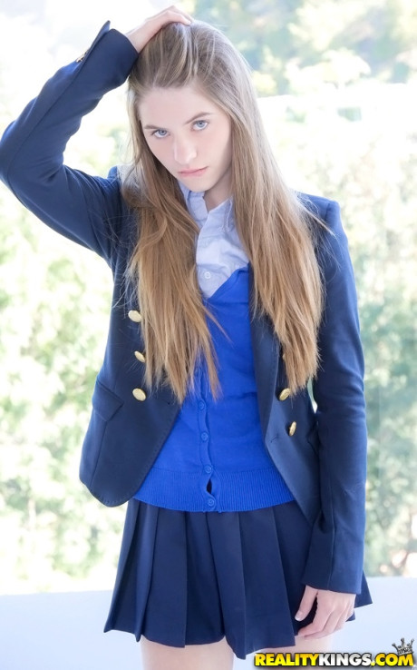 Long-haired teenage sweety Alice March gets rid of her uniform and panties