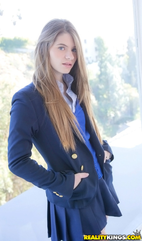 Long-haired teenage sweety Alice March gets rid of her uniform and panties