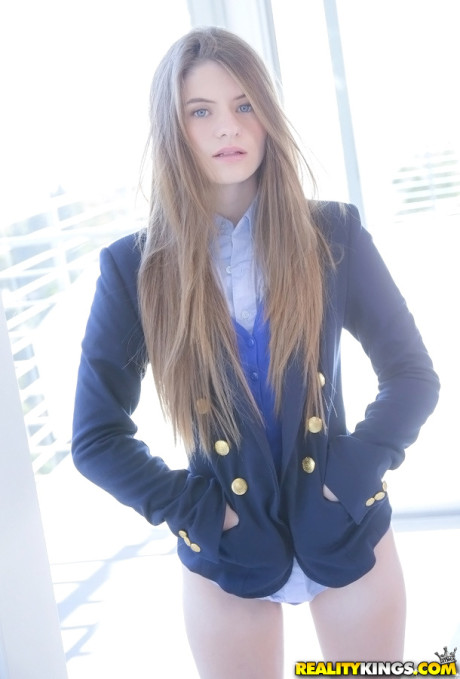 Long-haired teenage sweety Alice March gets rid of her uniform and panties