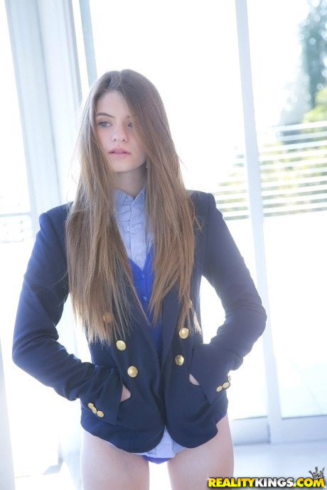 Long-haired teenage sweety Alice March gets rid of her uniform and panties