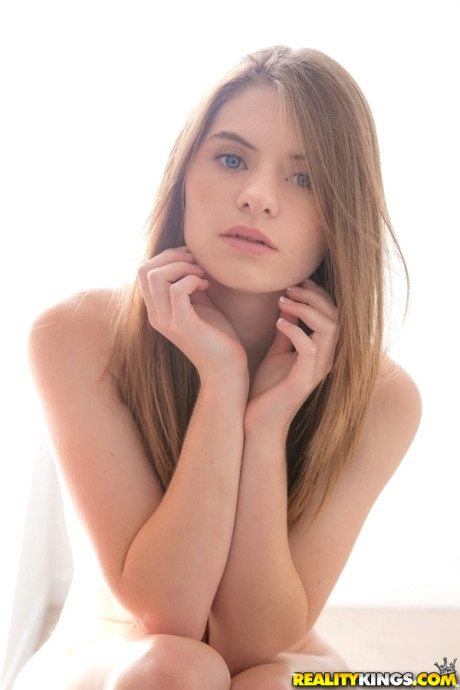 Long-haired teenage sweety Alice March gets rid of her uniform and panties