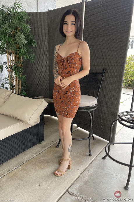 Brunette teen Stevie Moon	rubs her cute twat and shows her feet up close