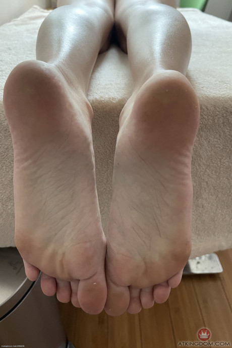 Brunette teen Stevie Moon	rubs her cute twat and shows her feet up close