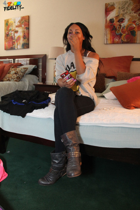 Exotic ebony chick Leilani Leeane reveals her sweet ass and medium breasts