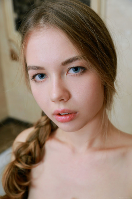 Humongous titted Russian teen Camilla Stan strips down nude and takes a hot shower
